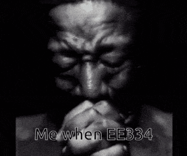 a black and white photo of a man with the words " me when ee334 " on the bottom
