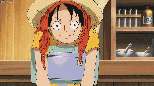 a cartoon character with a straw hat and a bandana on his head is smiling