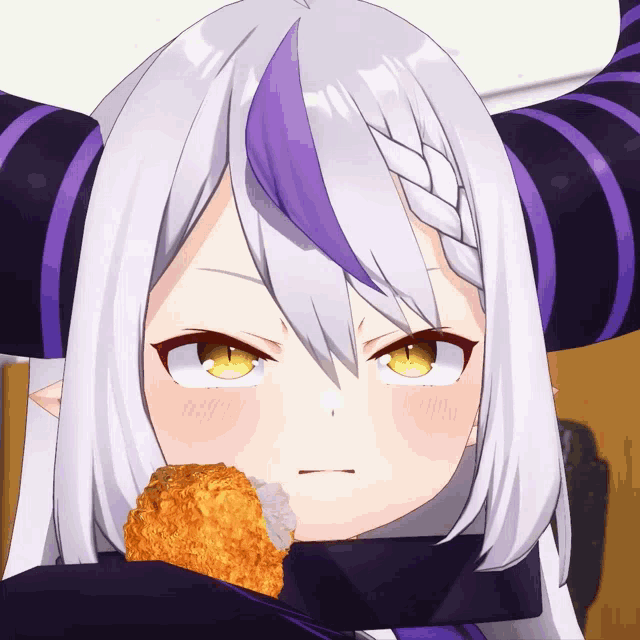 a close up of a cartoon character with horns holding a fried chicken nugget