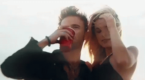 Drinking Fixing Hair GIF - Drinking Fixing Hair Couple GIFs