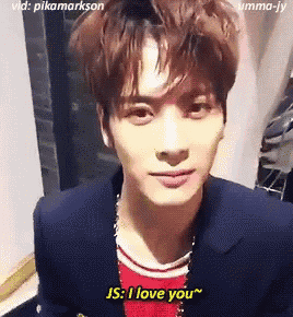 a close up of a person 's face with a caption that says i love you