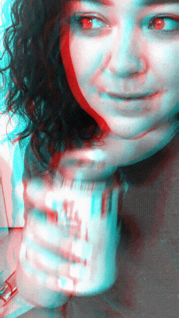 a woman with red eyes holds a can of soda