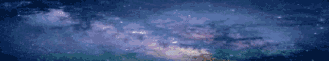 a night sky with a lot of stars and purple clouds