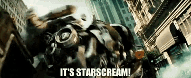 a transformer says it 's starscream while driving down a city street