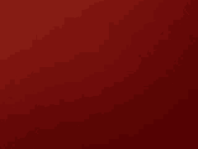 a close up of a red background that looks like a plain red background .