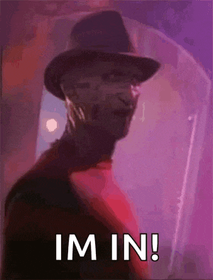 freddy krueger from nightmare on elm street is wearing a mask and a hat and says `` im in '' .