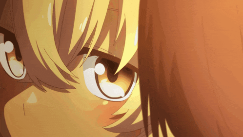 a close up of a person 's eye with a yellow hair