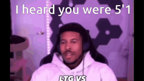 a man wearing headphones says i heard you were 5 ' 1 .
