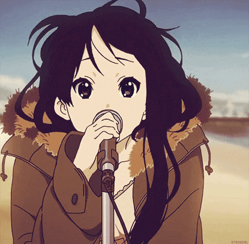 a girl in a brown jacket singing into a microphone with the word struggle on the bottom