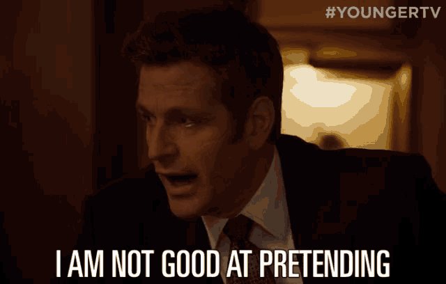 a man in a suit and tie is saying i am not good at pretending .