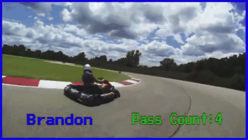a picture of a person riding a go kart with brandon pass count 4