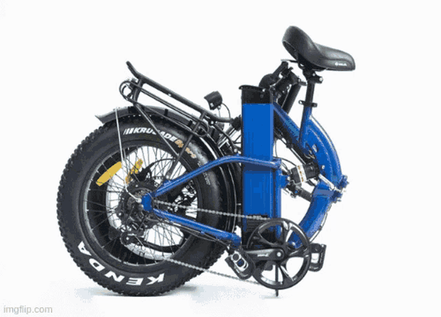 a kenda bicycle is parked on a beach