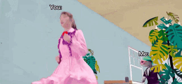 a woman in a pink dress is standing next to a frog in a purple suit and the words you and me are above her