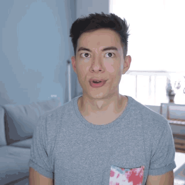 a man is making a funny face with the word fucking above him