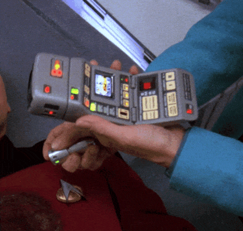 a person is holding a device with a screen that says " emergency "