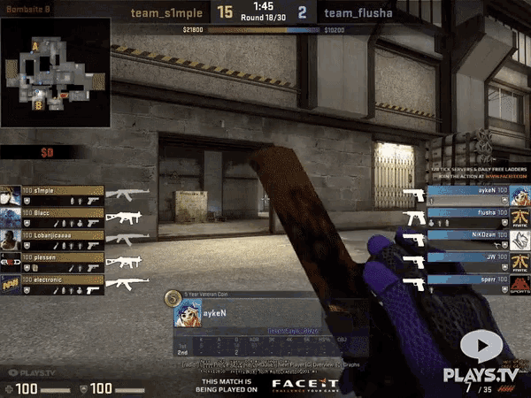 a video game is being played on plays.tv with a purple glove