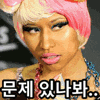 a close up of a woman wearing a pink wig and korean writing .
