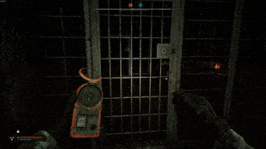 a man in a video game is standing in a cage with a compass on the floor