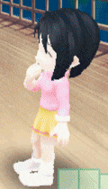 a little girl in a pink shirt and yellow skirt is standing on a wooden floor