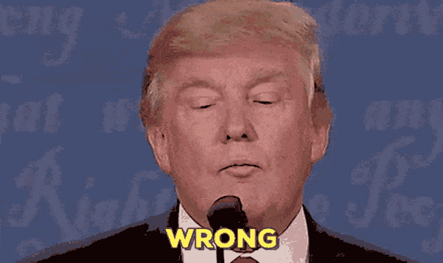 donald trump speaking into a microphone with the word wrong in yellow