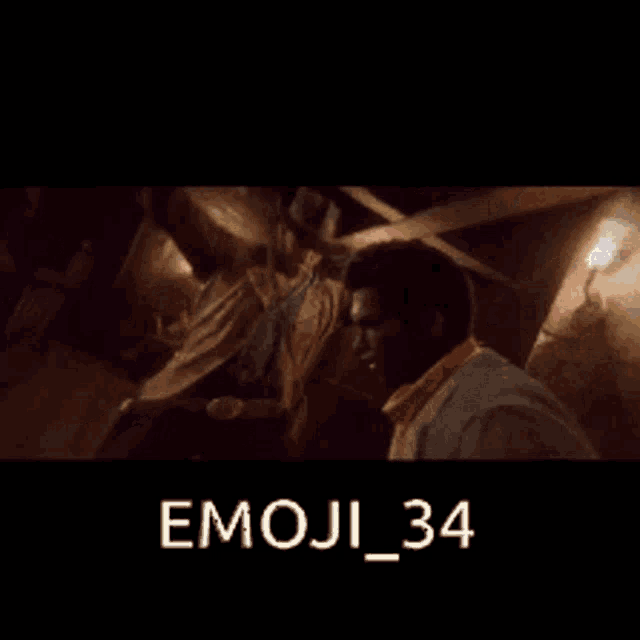 a man in a cowboy hat is standing next to another man in a suit with the words emoji_34 below them