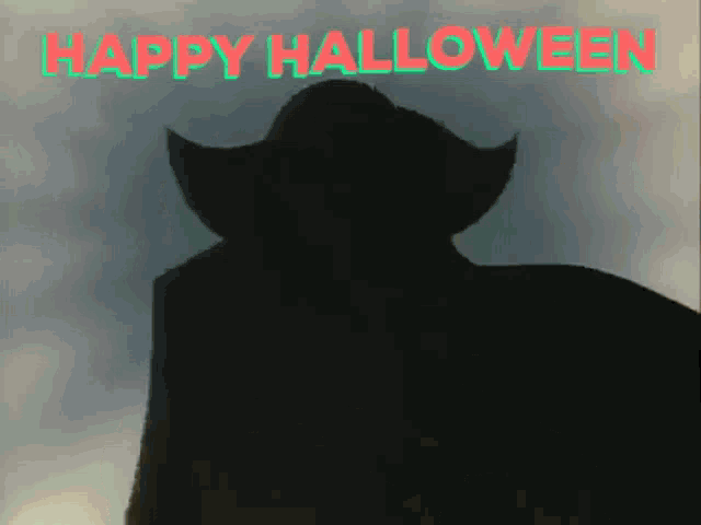 a silhouette of a man in a cowboy hat with the words " happy halloween " behind him