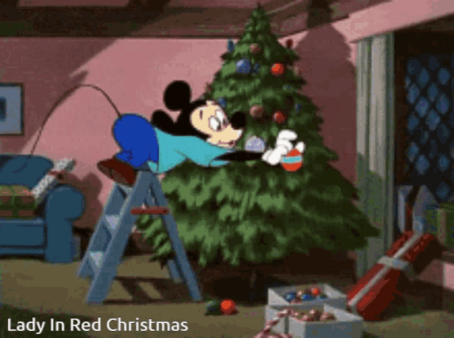 a cartoon of mickey mouse decorating a christmas tree with the words lady in red christmas below him