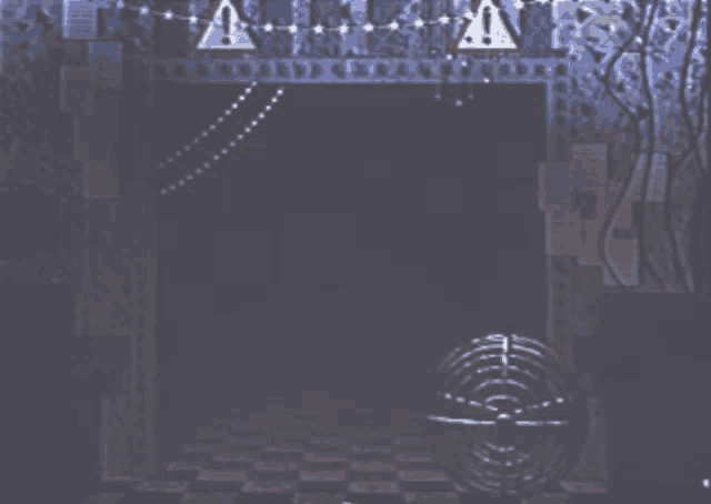 a dark room with a sign that says ' a ' on it
