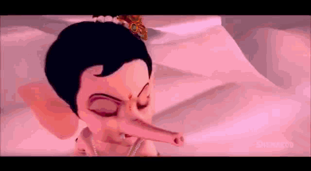a cartoon character with a long nose and a crown on his head .