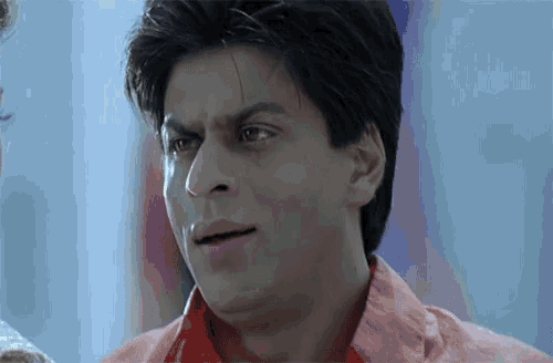 a close up of a man making a funny face