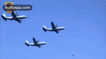 three planes are flying in a blue sky with a kulfyapp.com logo in the upper right corner