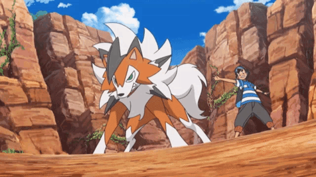 a boy standing next to a pokemon that looks like a fox