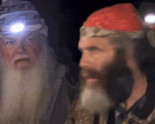 a man with a beard wearing a hat that says ' piper ' on it