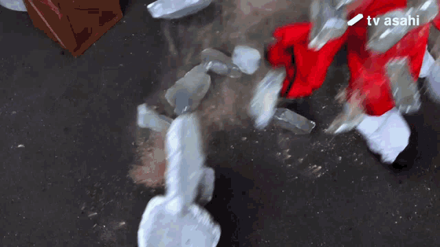 a tv asahi advertisement shows a cartoon character breaking ice
