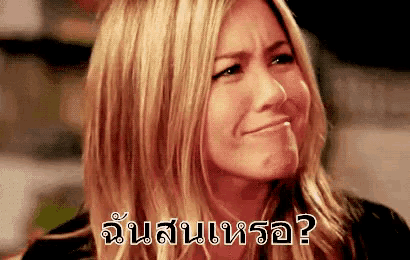 a woman with blonde hair is making a funny face in a foreign language with a question mark on her face