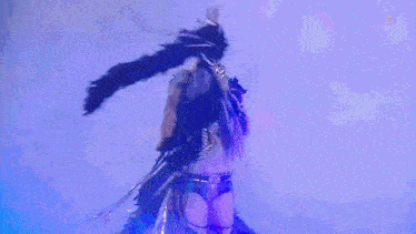 a woman in a costume with the name giulia on the bottom