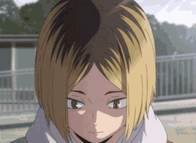 a close up of a person 's face with a shadow on it