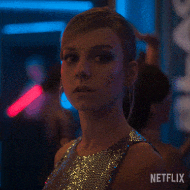 a close up of a woman 's face with the word netflix on the bottom