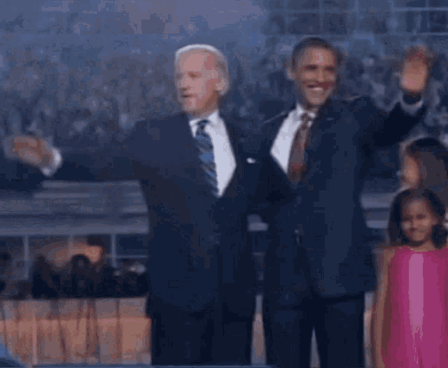 a man in a suit and tie is dancing with the words you ain 't black behind him
