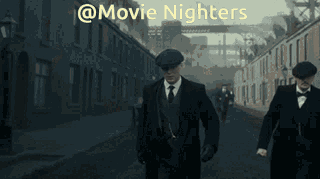 two men in suits walking down a street with the words movie nighters on the bottom