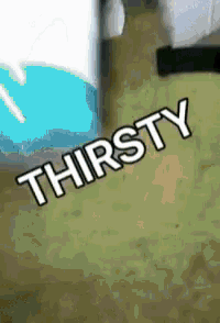 a sign that says thirsty next to a blue bottle
