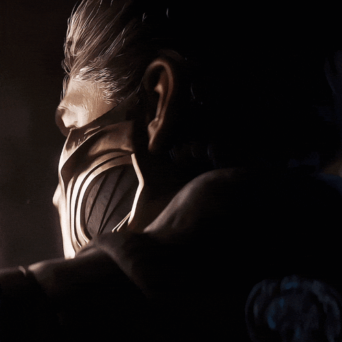 a close up of a man 's face with a mask on