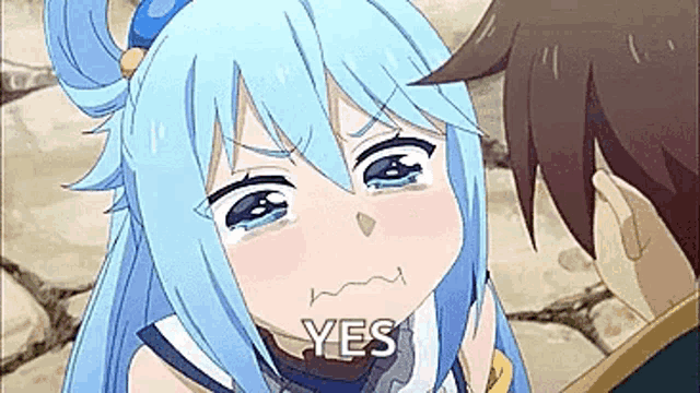 a girl with blue hair is crying while standing next to a man and saying yes .