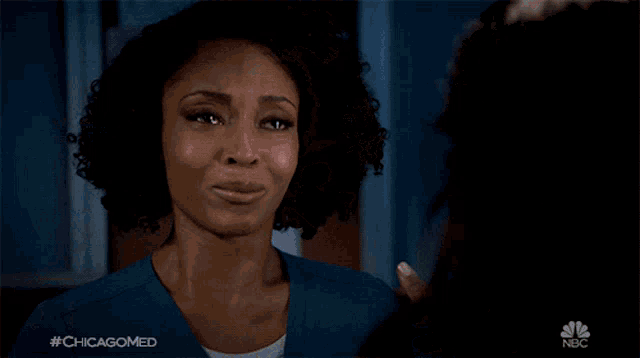 a woman hugging another woman with the hashtag #chicagomed on the bottom