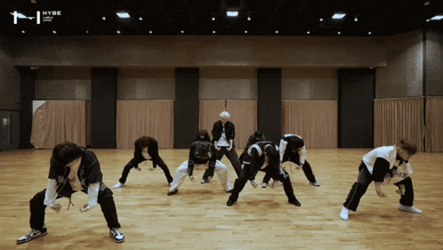a group of people are dancing in a room with the word hype on the bottom left