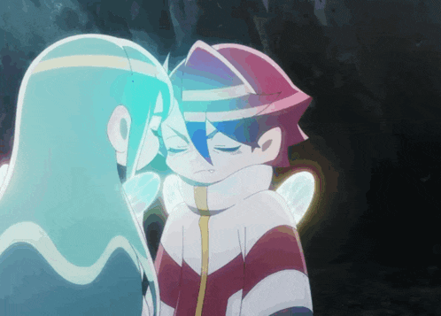 a boy and a girl are touching their foreheads