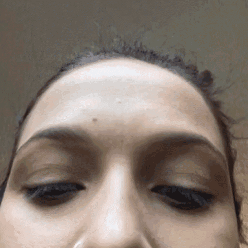 a close up of a woman 's forehead and eyebrows