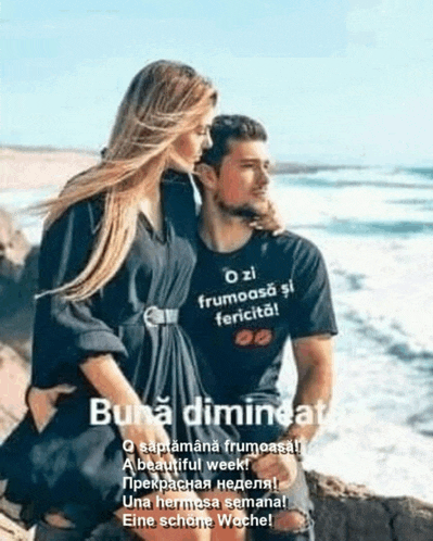 a man and a woman are sitting next to each other on a beach .