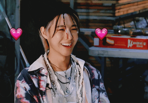 a person with a heart on their head and a box of k-mart behind them