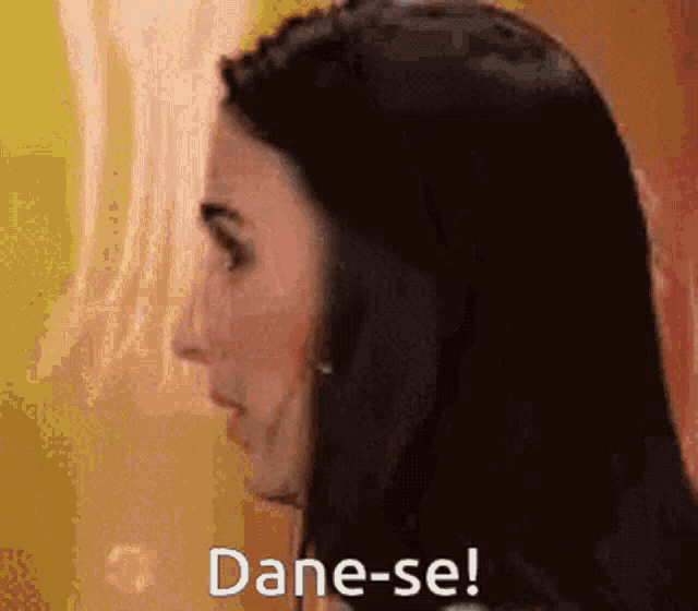 a close up of a woman 's face with the words dane-se written on the bottom